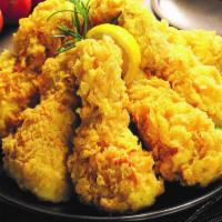 Crispy Fried Chicken (후라이드 치킨) · A light flaky texture.