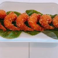 Shrimp Tempura (새우튀김) · 7 pieces. Shrimp tempura covered in bread crumbs.