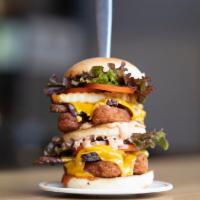 Beyond Chicken Animal Burger · The Delicious, Crispy, and Long-Awaited Beyond Chicken is Here! This Towering Burger Comes w...