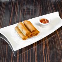 Egg Rolls · Deep fried vegetable rolls served with sweet chili sauce.