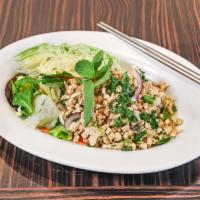 Larb Chicken Salad · Minced chicken tossed with mint, onion and a lime dressing served with mixed green. Spicy le...
