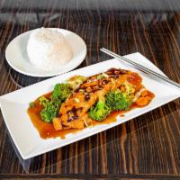 Salmon Teriyaki · Grilled Salmon on steamed vegetable with house teriyaki sauce.  Serve with steamed rice.
