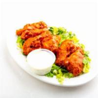 Chicken Wings · Chicken wings available either in plain, buffalo, or bbq tossed.