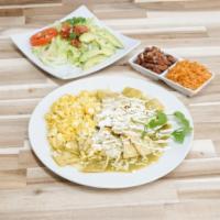 Chilaquiles · Scrambled or fried egg mixed with crispy tortilla strips and spicy salsa (red or green). Ser...