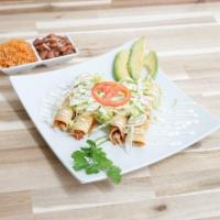 Flautas · Shredded chicken or beef wrapped in 4 crispy fried tortillas (think taquitos) topped with le...