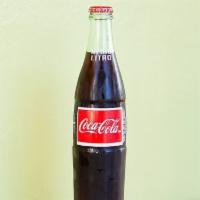 Mexican Coke · Half-litre glass bottle of authentic Mexican coke (made with real sugar).