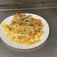 Italian Omelette · Sausage, peppers, onions, tomato, and mozzarella cheese.