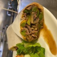 BBQ Steak Wrap · Sliced roast beef, peppers, onions, mushrooms and cheese.