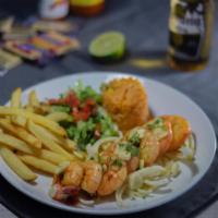 Camarones al Gusto · Sautéed shrimp with butter topped with your choice of sauce.