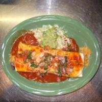 Carne Asada Burrito · A flour tortilla filled with skirt steak, rice, and beans topped with our own special red sa...