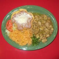 Chile Verde · Chunks of pork slowly cooked in our special green tomatillo sauce. Served with Spanish rice ...