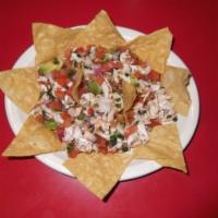 Ceviche · Premium Tilapia fish or shrimp with pico de gallo and cucumber mixed with fresh spices, cure...
