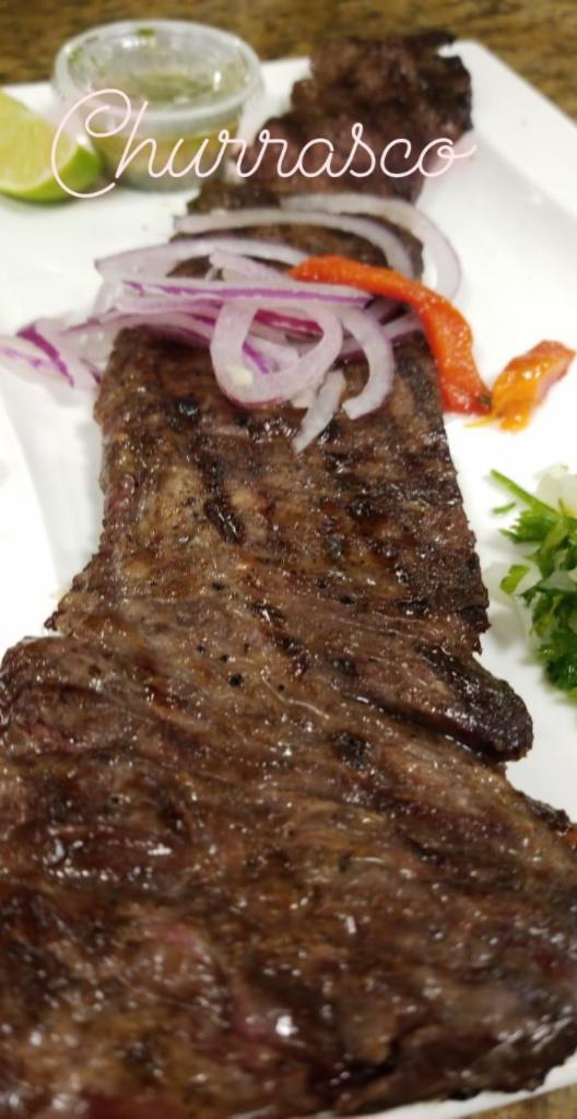 Churrasco and Sopa del Dia · Grilled skirt steak with chimichurri sauce. Come with soup of the day and 2 sides.
