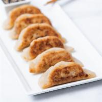 Sweet Potato Potstickers · Gluten-free potstickers filled with sweet potato, fresh garlic, and fresh ginger. Pan fried ...