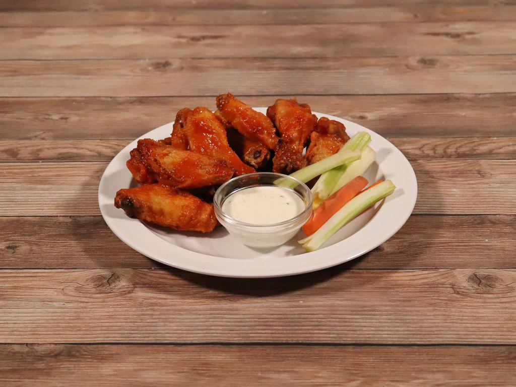 Wings Plate · 8 Jumbo wings in your choice of our house made sauce. Served with celery, carrots  and ranch or bleu cheese.