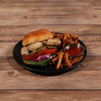 Grilled Chicken Sandwich · Marinated and grilled chicken breast, lettuce, tomato, red onions, house-made pickles, Kolsc...