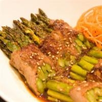 Asparagus Beef Roll · Blanched asparagus, beef strip loin and sweet ginger garlic sauce served with rice.