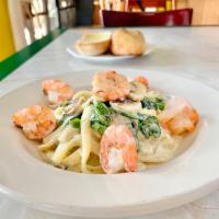 Shrimp & Veggie Fettuccine Alfredo  · Fettuccine pasta in cream with fresh mushrooms, spinach and shrimp with garlic bread.