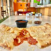 Cheese Calzone · Filled with mozzarella cheese and marinara sauce. Add toppings for an additional charge.