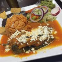 Chiles Rellenos · 2 poblano peppers stuffed with Mexican cheese in tomato salsa criolla, served with rice and ...