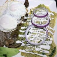 CHILAQUILES CLASICOS · fried tortilla strips simmered in a spicy red sauce or tomatillo sauce, served with Mexican ...