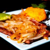 BISTEC ENCEBOLLADO · STEAK OVER SAUTEED ONIONS, RICE AND BEANS , TORTILLAS.