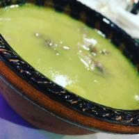 POZOLE VERDE · HOMINY PORK SOUP IN GREEN TOMATILLO SAUCWWE, WITH TWO TOSTADAS.