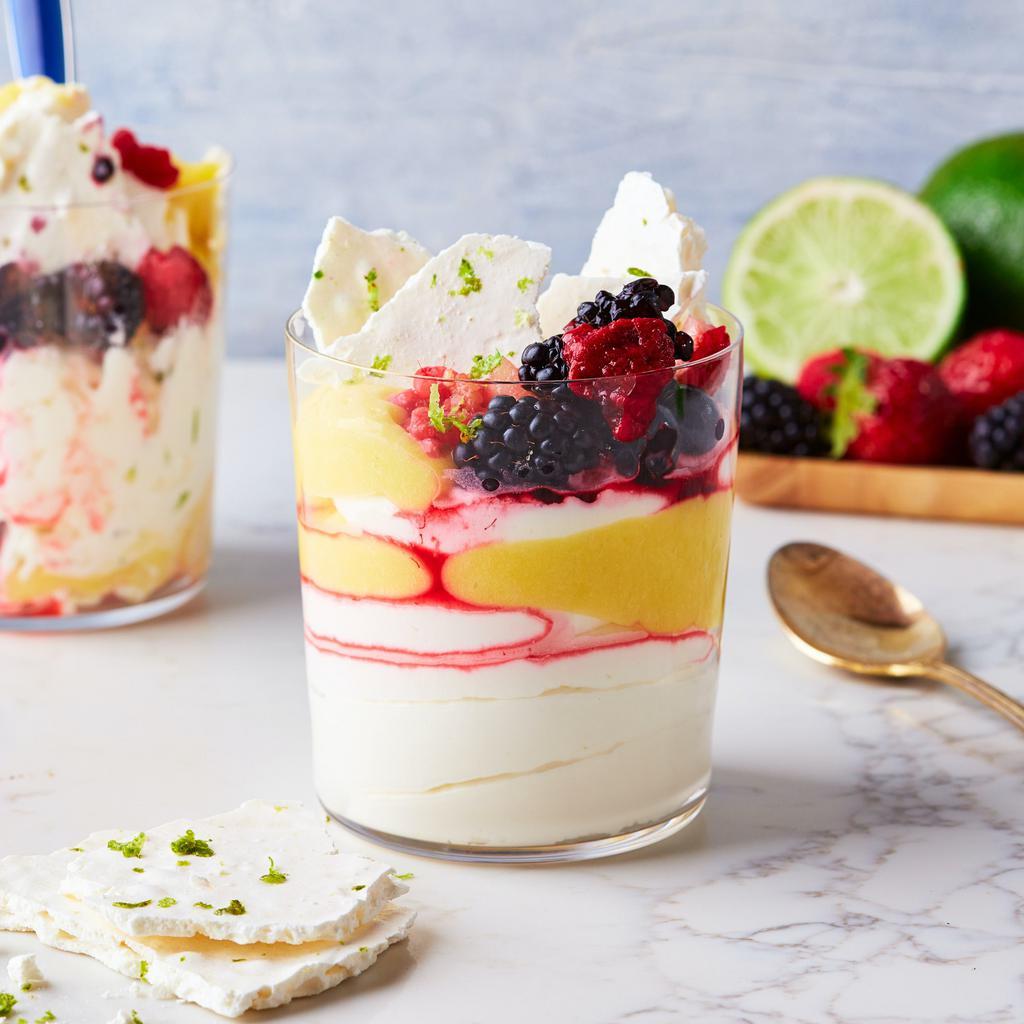 Berry Mess · This whipped crème fraiche is perfectly layered with lime meringue, fresh berries and creamy lemon curd.  Best shaken and stirred upon arrival for maximum flavor | Allergen: Milk, Egg