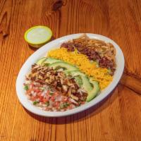 Mexican Cobb Salad · Fajita chicken with bacon, pico de gallo, cheese, avocado and tortilla strips. Served with a...