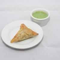 Beef Samosa · Ground beef and cabbage in a crispy triangular pastry.