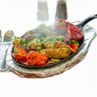 MIX SIZZLING KABOB · Chicken sish Kabob , Beef sish Kabob, Chicken Tandori, Chicken Boti Kabob