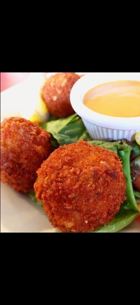 Cajun Shrimp Balls · A mixture of shrimp, corn, rice and Cajun seasoning lightly breaded and fried and served with spicy aioli sauce.