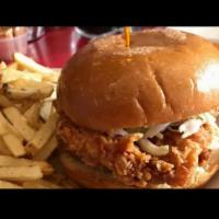 Fried Chicken Breast Sandwich · Fried boneless chicken breast and coleslaw served on a toasted bun with house-made aioli sau...