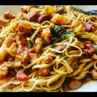 Jambalaya Pasta · Linguine pasta, shrimp, chicken and beef sausage sauteed with onions, bell peppers and tomat...