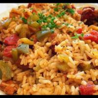 Jambalaya Rice · Rice, shrimp, chicken, and beef sausage sauteed with onions, bell peppers, and tomatoes in a...