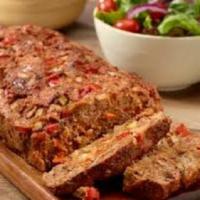 Cajun Meatloaf · Fresh ground chuck with Cajun seasoning served with gravy.