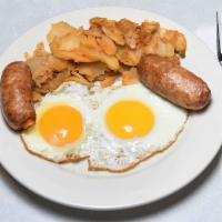 2 Eggs on a Platter Breakfast · A classic hearty breakfast served with potatoes and toast,