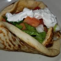 Gyro Sandwich · Filled with onions, tomato, lettuce and tzatziki sauce.
