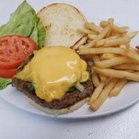 Cheeseburger Deluxe · American, Swiss, cheddar or mozzarella cheese. Includes french fries, lettuce, tomato, coles...