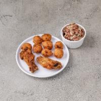 2 Pieces Fried Chicken Dinner · Includes 2 helpers of your choice and 2 hush puppies.