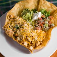 Taco Salad · House salad with chicken, carne asada, carnitas or ground beef, refried beans, corn, cheese,...