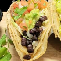 Black Bean Taco · Black beans, pico de gallo, lettuce and guacamole in a flour or corn tortilla.