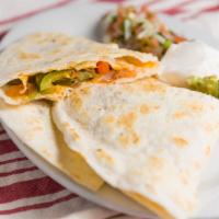 Veggie Quesadilla · Grilled onions, red and green bell peppers, mushrooms and zucchini. 