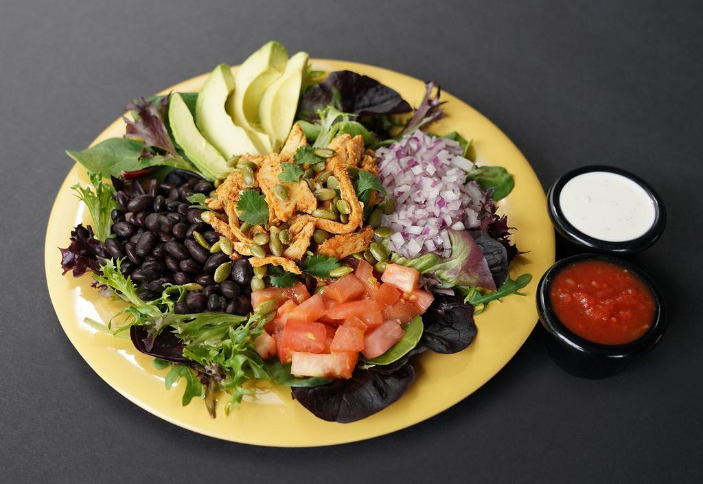 Southwest Salad · Organic Field Greens, Black Beans, Diced Tomato, Sliced Avocado, Diced Onion, Pepitas, Cilantro, Served with fresh mild red salsa and choice of dressing.