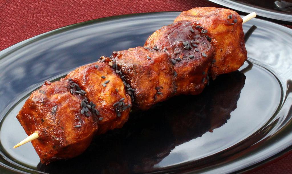 BBQ Tofu Skewer · Seasoned organic tofu skewer baked with sweet and tangy barbecue sauce.