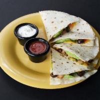 Deluxe Quesadilla · Cheddar cheese, diced tomatoes, olives, sliced avocado, cilantro. Served with fresh mild red...