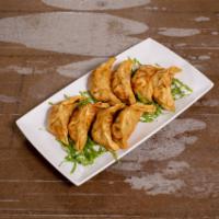 5. Chicken Gyoza · 8 Pieces. Fried dumplings with vegetables.