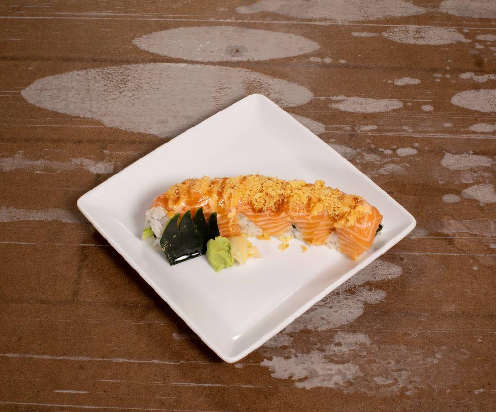 2. Yummy Roll · Avocado, cucumber, spicy tuna inside with salmon, spicy mayo, eel sauce and crunch flakes on top.