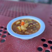 Homemade Minestrone Soup · Soup made with noodles, potatoes, kidney beans, carrots, cauliflower, zucchini, celery & oni...