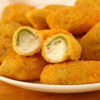 20 pc Jalapeno Poppers · Jalapeno Poppers Stuffed with cream cheese. served with a side of Pizza sauce